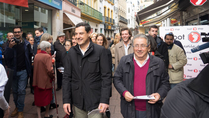 Juanma Moreno y Juan Ignacio Zoido, candidatos del PP al Parlamento para las elecciones andaluzas.