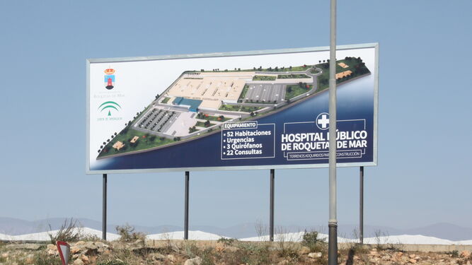 Valla anunciadora de la próxima construcción del Hospital de Roquetas de Mar.