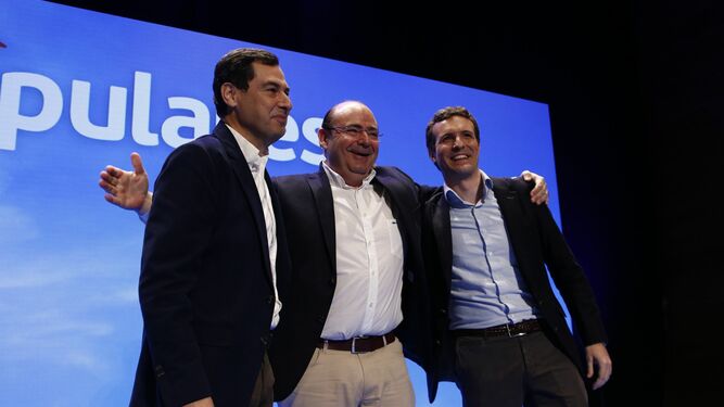 Juanma Moreno, Sebastián Pérez y Pablo Casado, durante la presentación de la candidatura de la Gran Granada.
