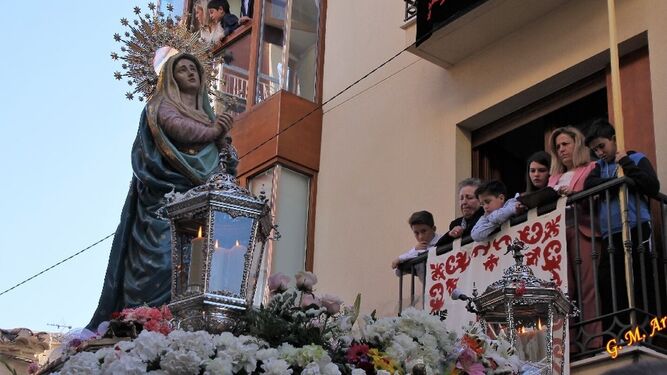 Nuestra Señora de los Desamparados (Virgen del Río) por las calles de la localidad.